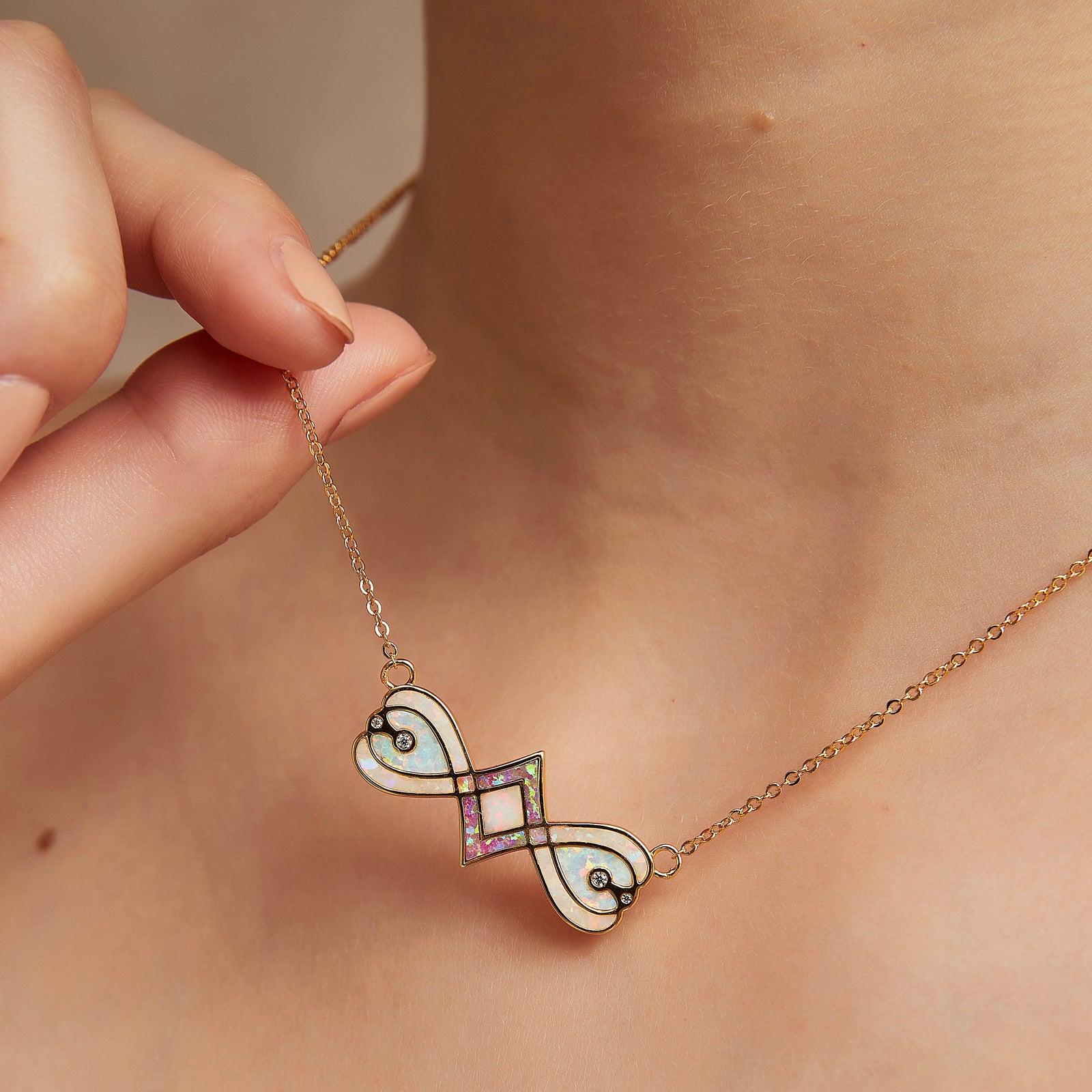 Bow tie opal necklace close-up showing stained glass pattern - GL.rareness