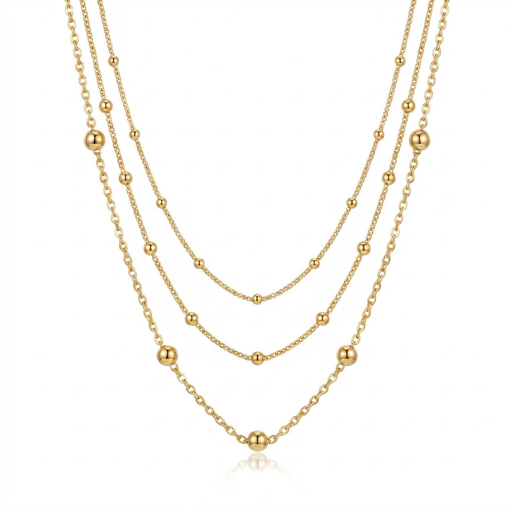 Delicate three-layered gold beaded chain necklace isolated on white background - GL.rareness